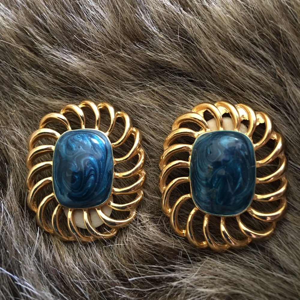 Vintage gold tone swirl blue enamel clip earrings